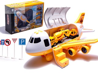 Samolot transporter z autami maszyny budowlane bok