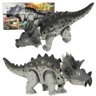 Dinozaur Triceratops chodzi świeci ryczy