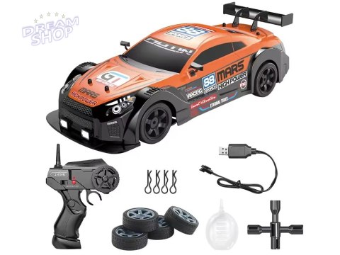 DUŻY Samochód Do Driftu Auto RC Drift 1:16 2,4 GHz PARA DYM 4WD Pomarańczowy Nissan GTR LED DUŻY Samochód Do Driftu Auto RC Drift 1:16 2,4 GHz PARA DYM 4WD Pomarańczowy Nissan GTR LED