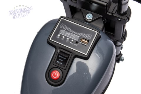 Motorek Chopper FASTER na akumulator dla dzieci Szary + Radio FM + Panel audio + LED Motorek Chopper FASTER na akumulator dla dzieci Szary + Radio FM + Panel audio + LED