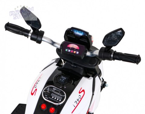 Motorek Fast Tourist na akumulator dla dzieci Biały + Audio + Światła + Ekoskóra Motorek Fast Tourist na akumulator dla dzieci Biały + Audio + Światła + Ekoskóra
