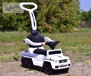JEŹDZIK NA AKUMULATOR, PCHACZ, ODPYCHACZ MERCEDES G 63 AMG 6X6, MIĘKKIE KOŁA, DASZEK , STEROWANIE RĄCZKĄ /1838 LONG