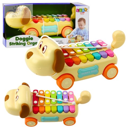 Jeżdżący Piesek Cymbałki Ruchome Uszy Ogon Pałeczka Na Sznurku